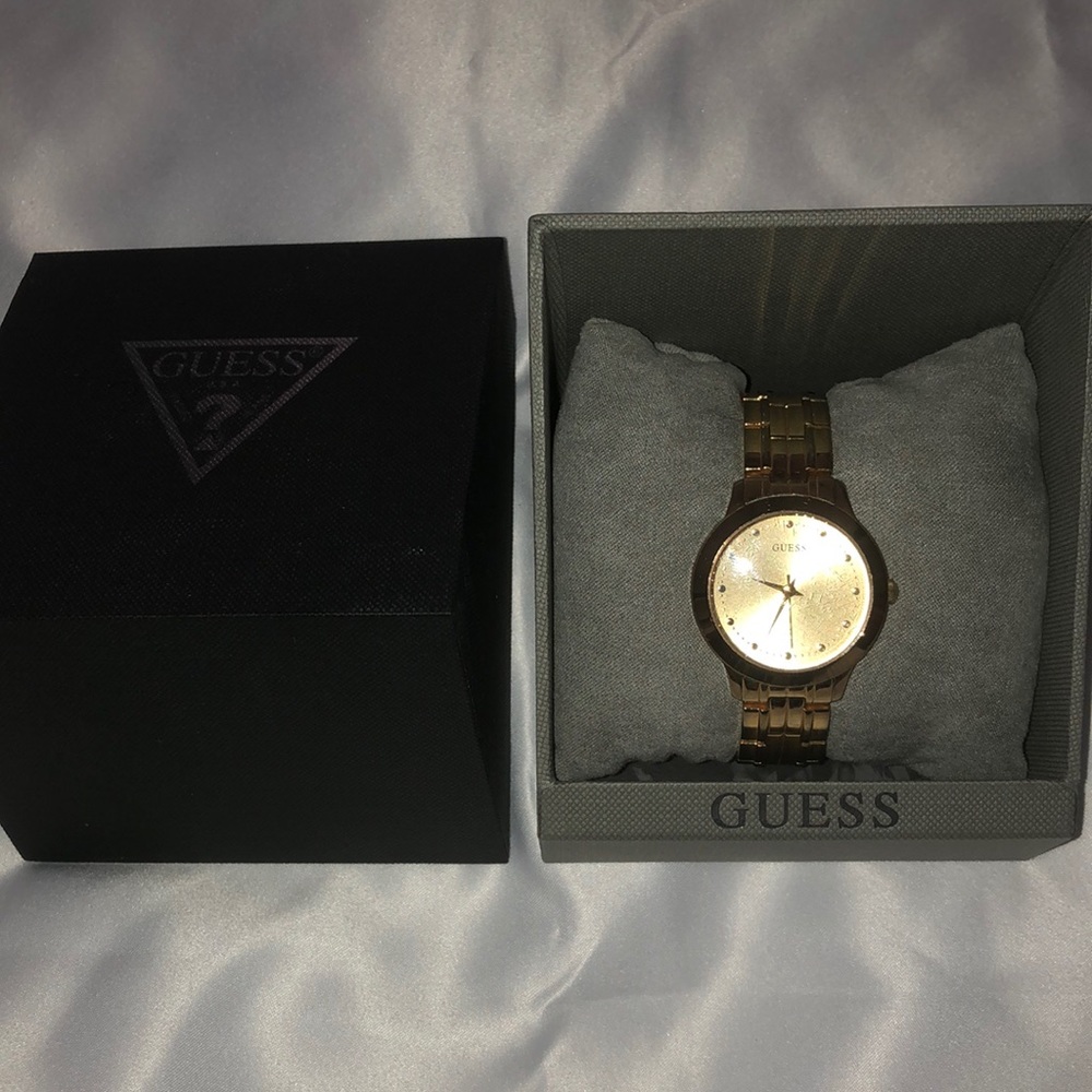 Gold guess watch